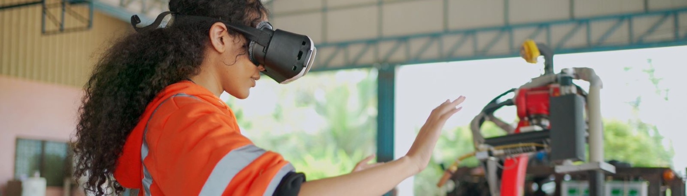 robotics student using a virtual reality headset